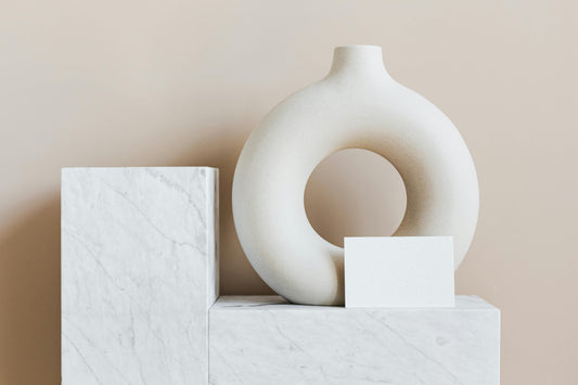 White Vase on Top of the White Marble